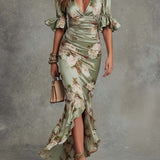 Dearbhla - Asymmetrical long dress in green with V-neck, flared puff sleeves, and floral pattern